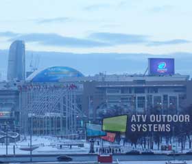 Huge LED screen on the roof of the modern trade center in Moscow